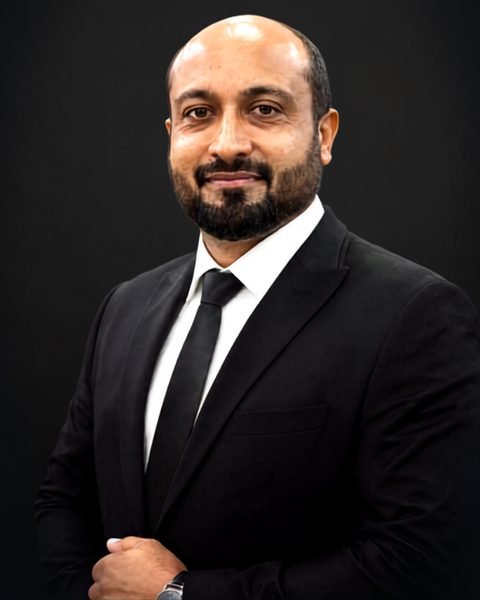 Haroon Khalid, Senior Mortgage Consultant at Loan Arrangers, studio portrait