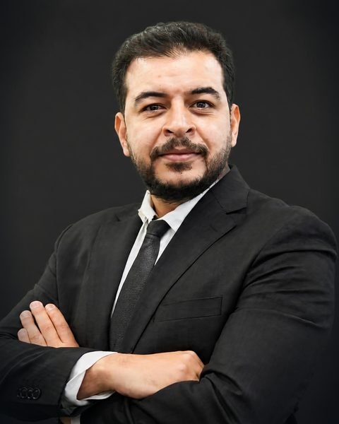 Hossam Emad, Senior Mortgage Consultant at Loan Arrangers, studio portrait